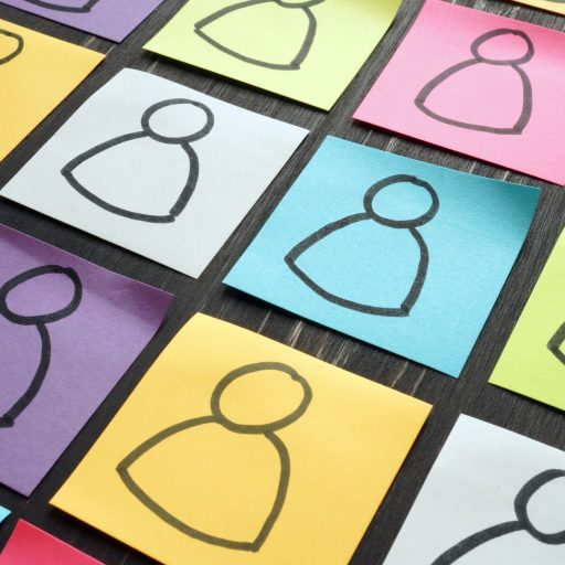 Diversity and inclusion illustrated with colorful sheets.