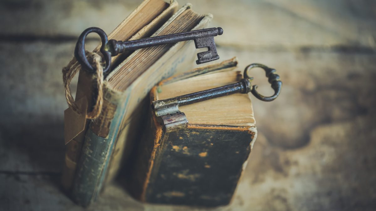 Books with keys set on top.