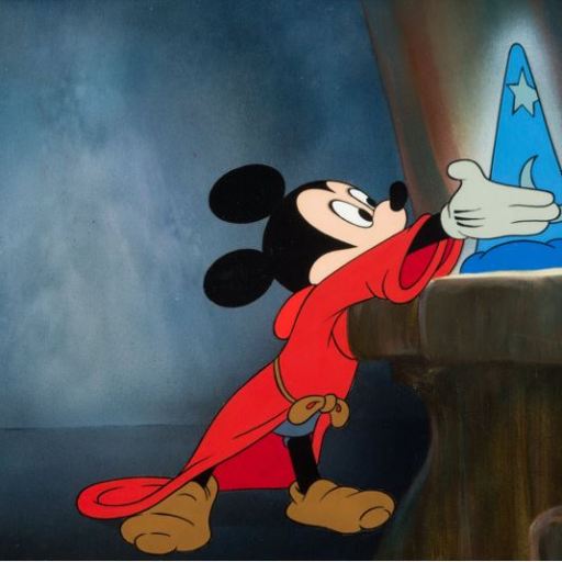 Mickey Mouse reaches for the magical hat in The Magician's Apprentice.