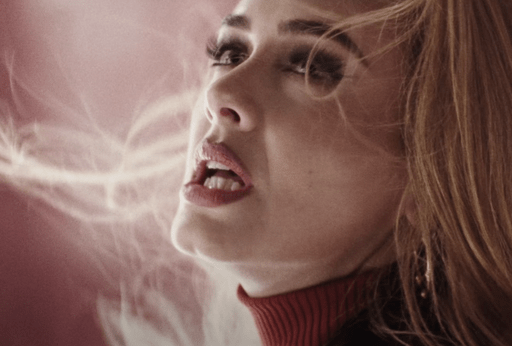 Adele singing; why sad songs make us feel good.