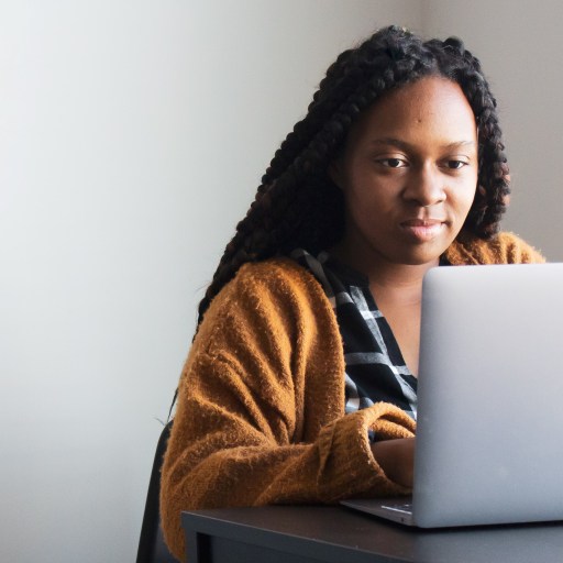 A woman doing therapy on her laptop