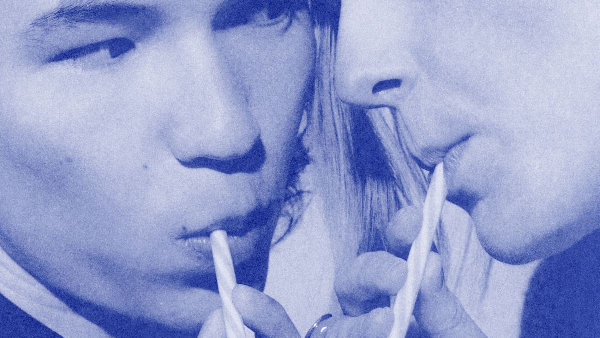 Two people face each other closely, each sipping from their own straw. The blue-tinted image, echoing the 37% rule of making choices, reveals only part of their faces, hinting at a moment of decision or connection.