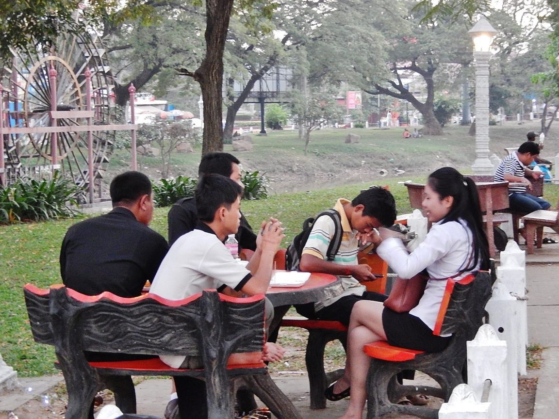 Kids hanging out in the park.