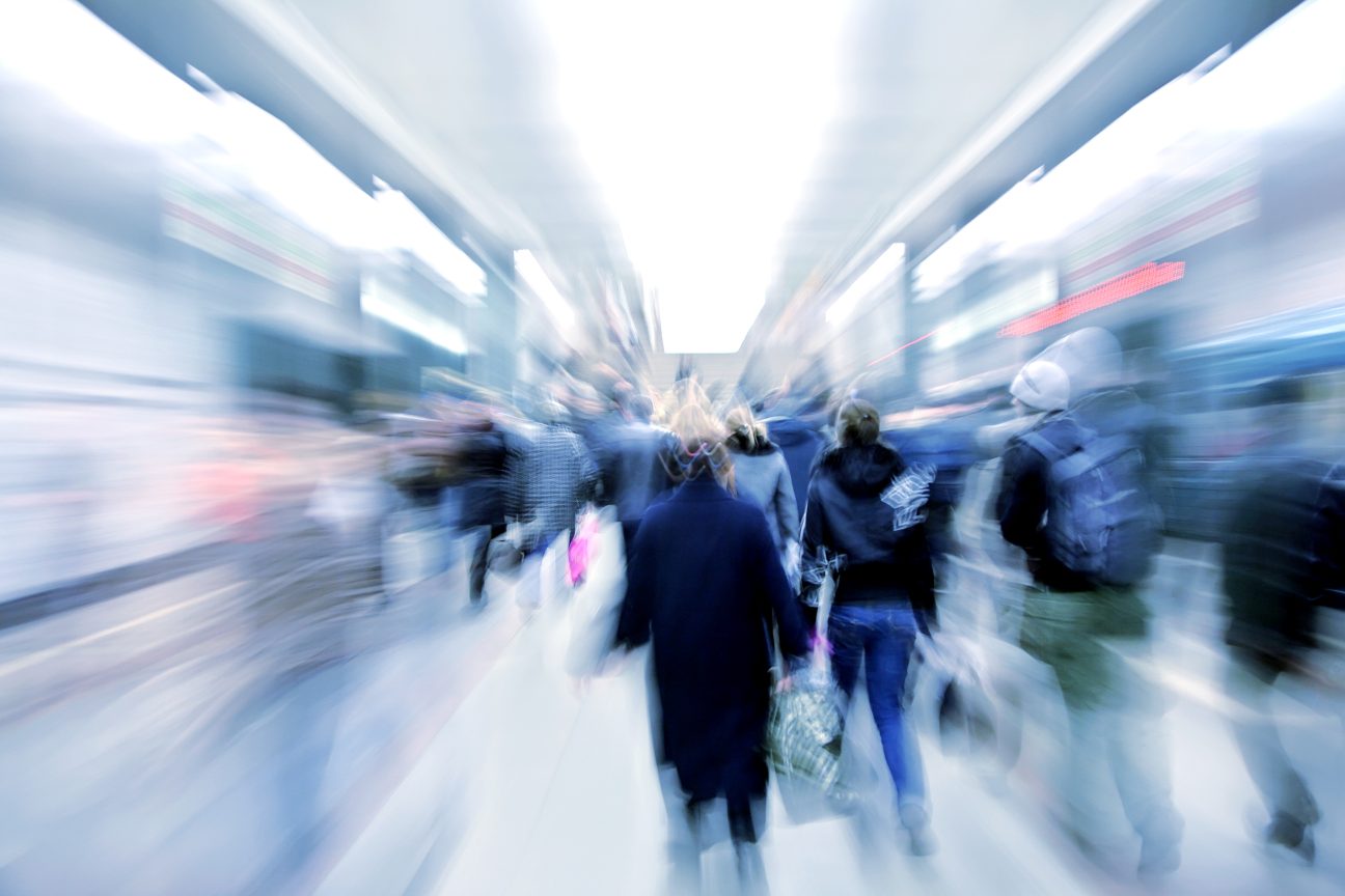 Passengers zooming by in subway.