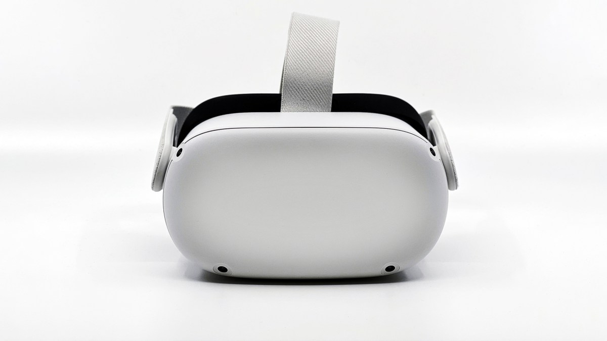 A white virtual reality headset on a white background.