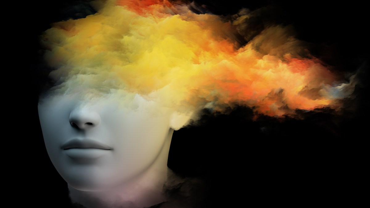 a woman's head with smoke coming out of it.