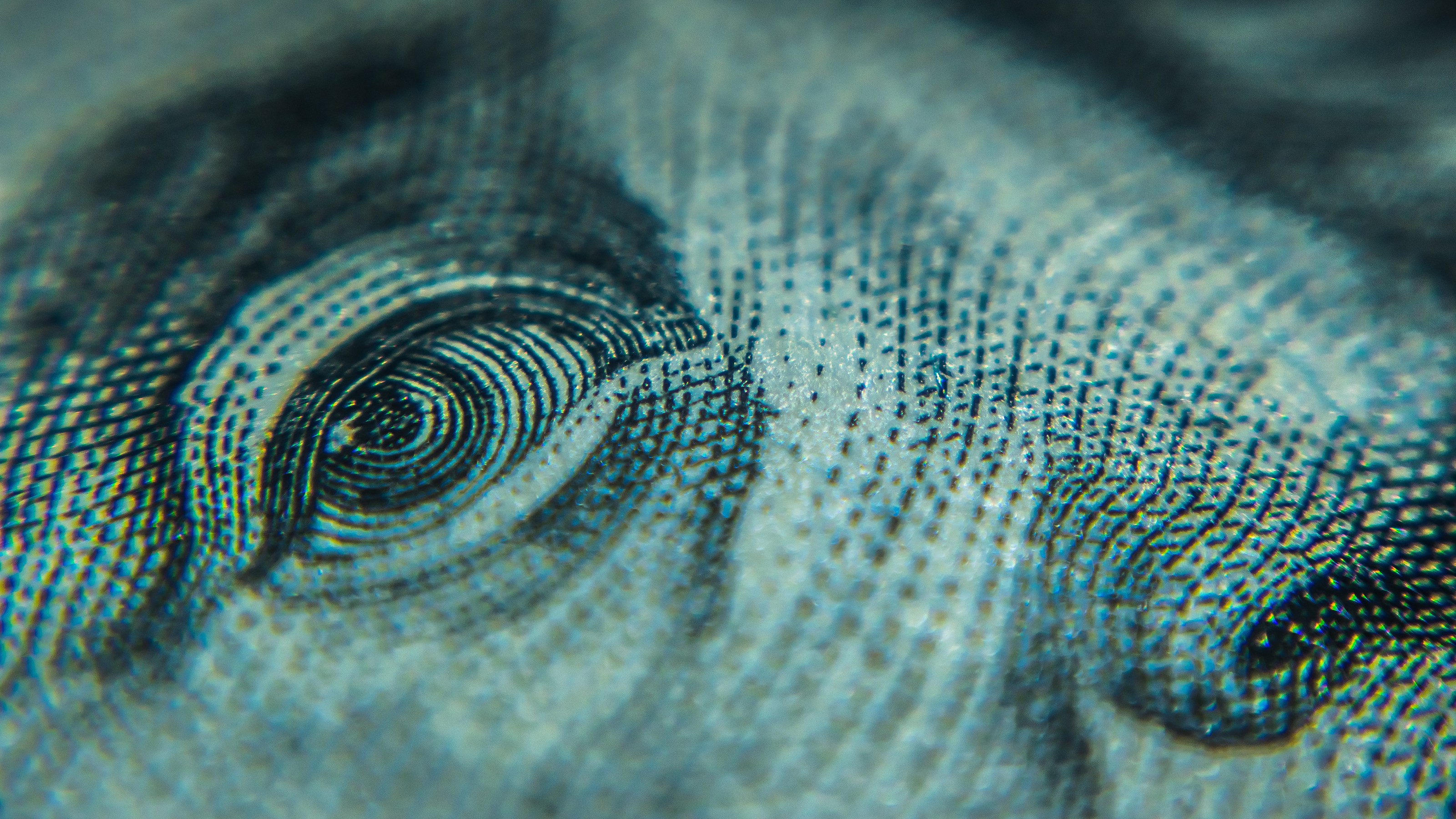 a close up of a blue dollar bill.