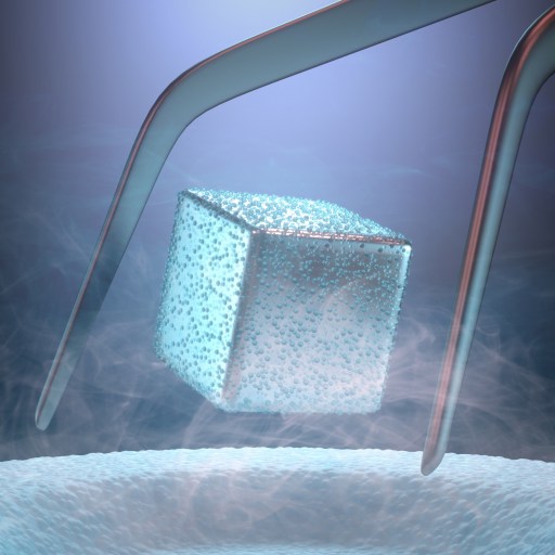 Magnet levitating above a high-temperature superconductor, cooled with liquid nitrogen.