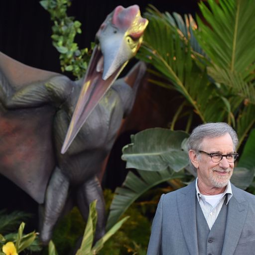 Steven Spielberg in front of a pterodactyl