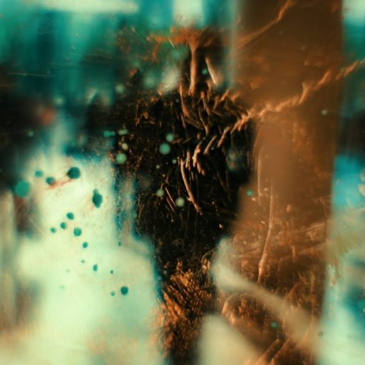 a blurry image of a person walking down a street.