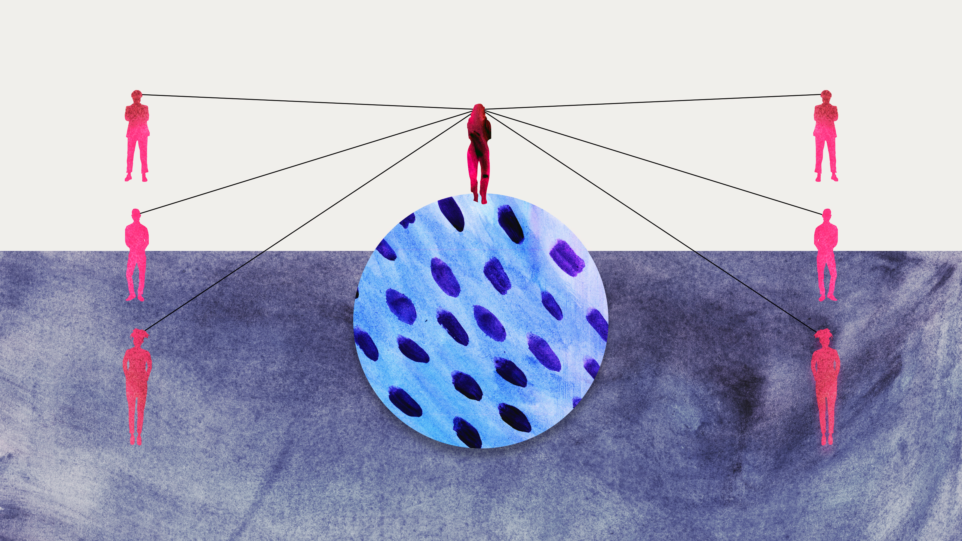 a group of people standing around a blue object.