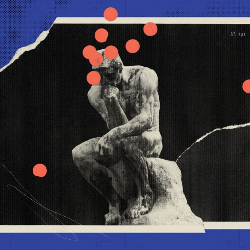 a black and white photo of a man sitting on a rock.