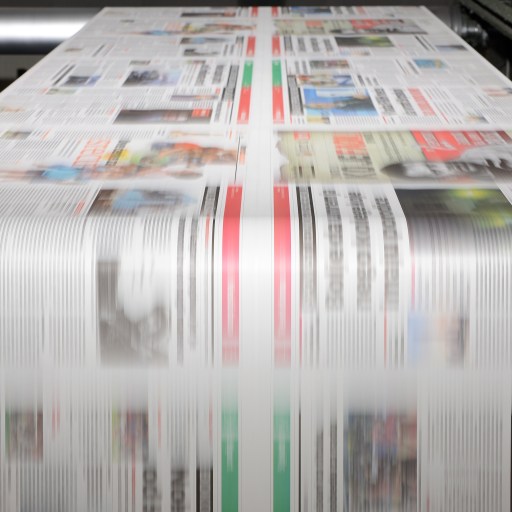 newspapers on a printing press