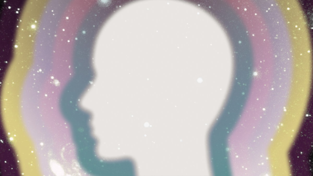 a silhouette of a person with a rainbow in the background.