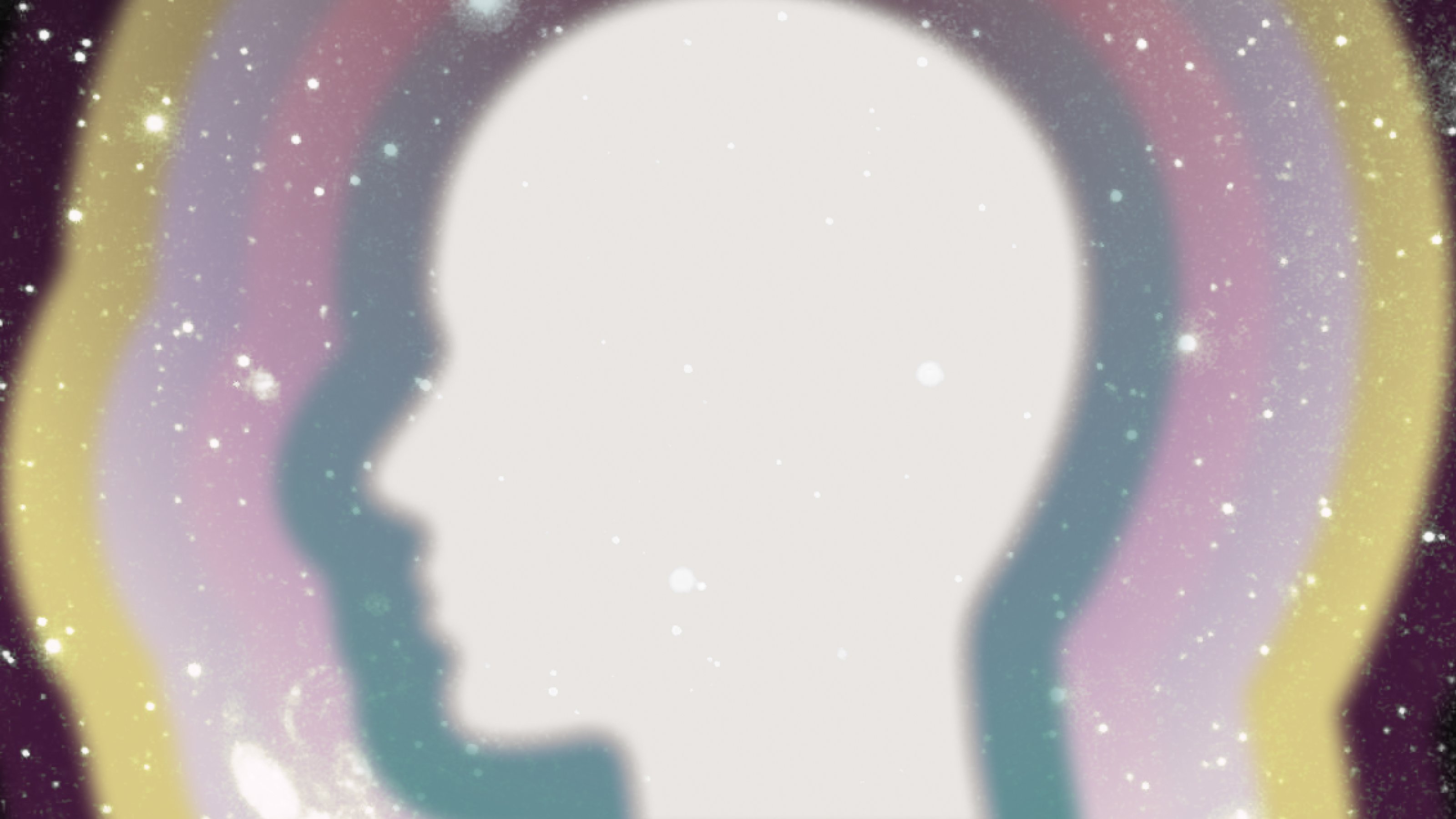a silhouette of a person with a rainbow in the background.