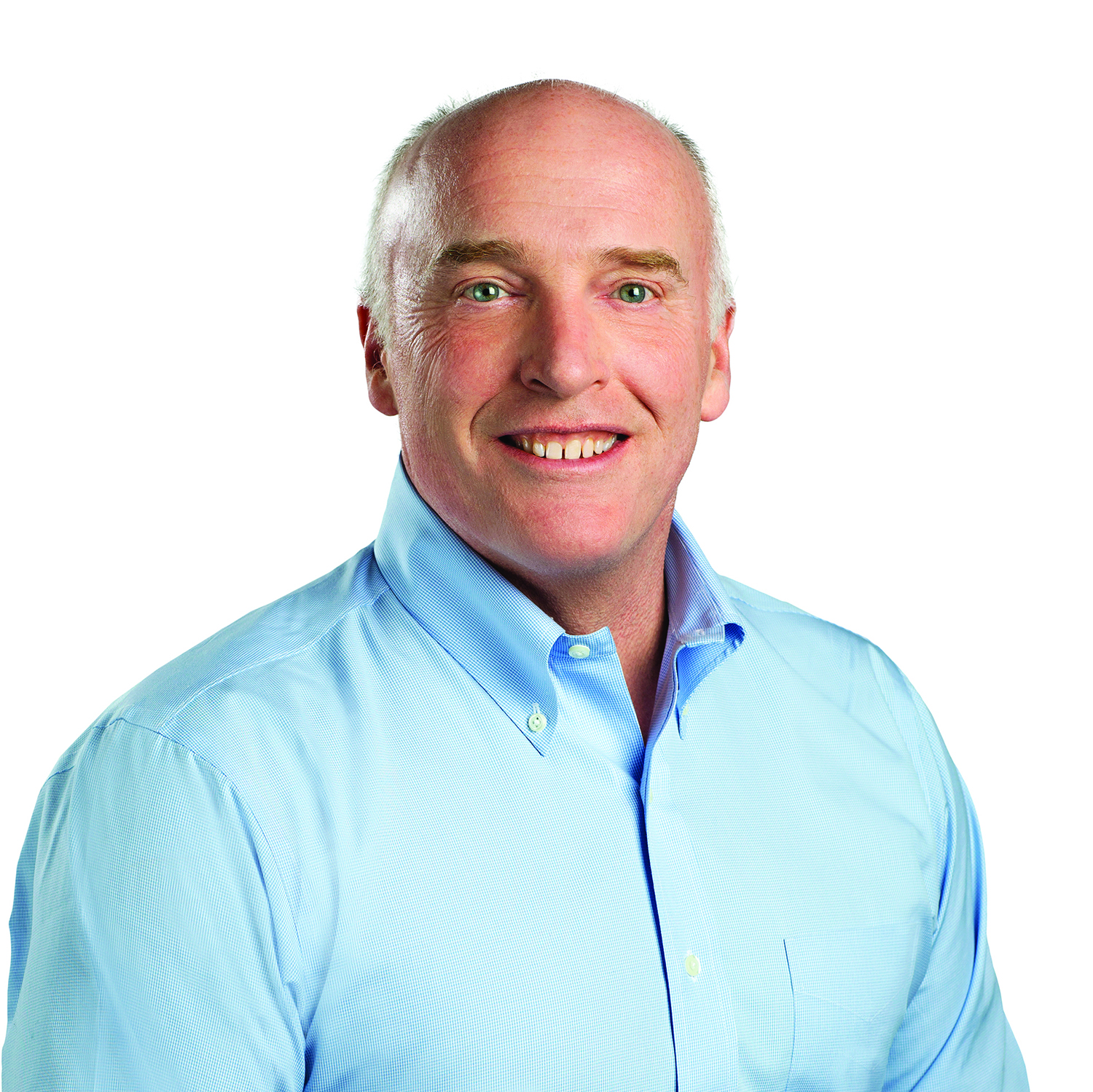 a man in a blue shirt is smiling.