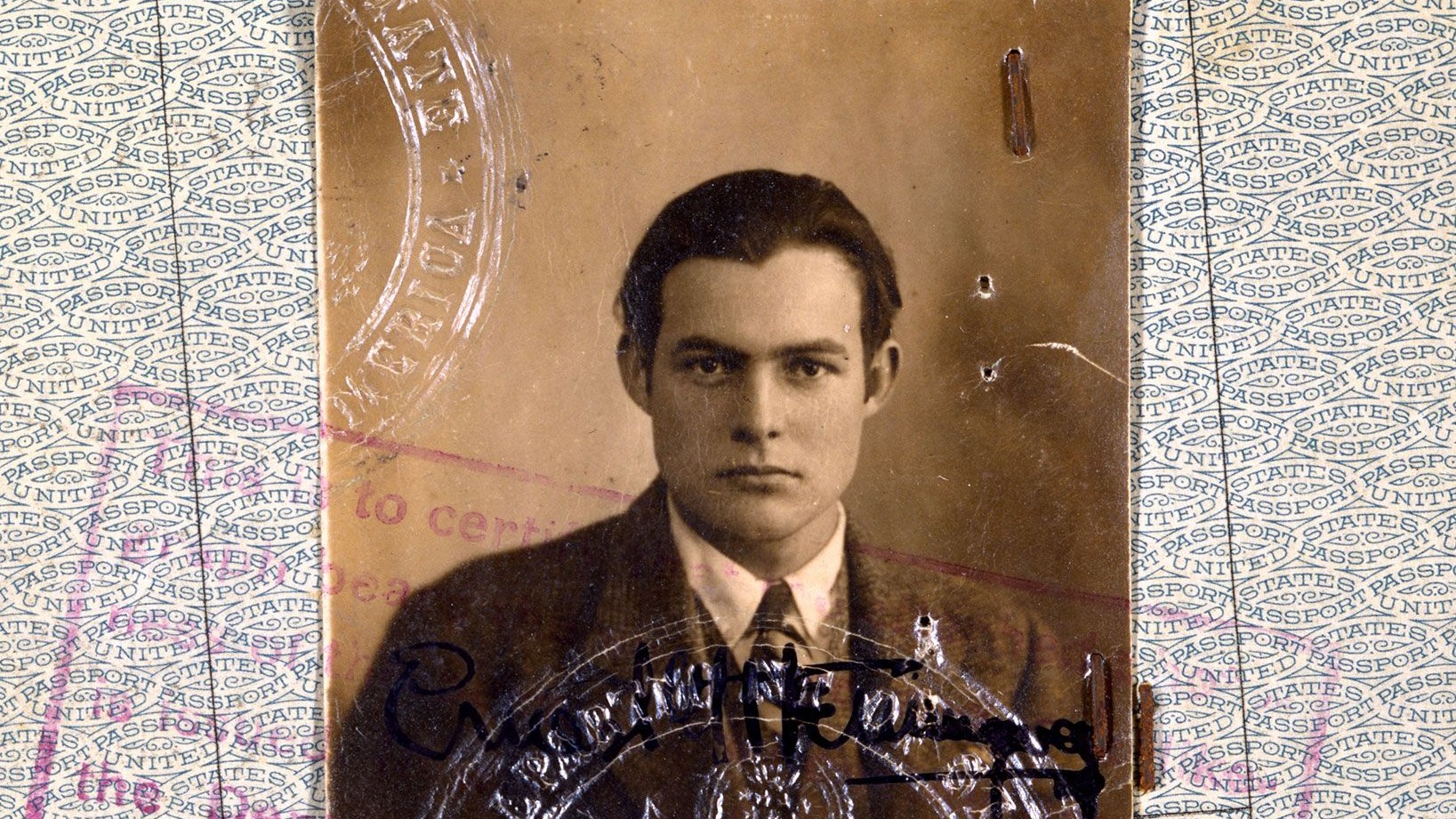 an old photo of a man in a suit and tie.