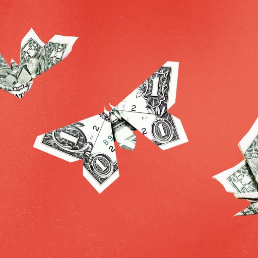 a red background with dollar bill origami airplanes.