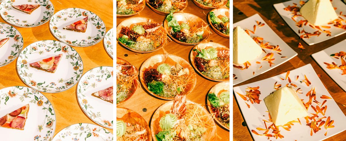 a table topped with plates of food covered in toppings.