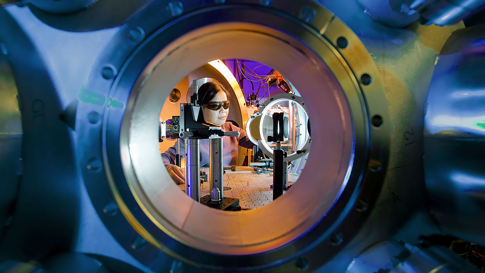 a close up of a metal object with a reflection in it.