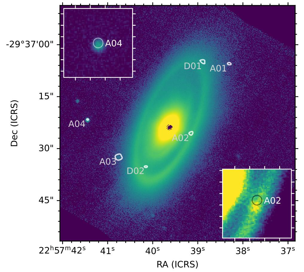 a black hole in the middle of a blue sky.