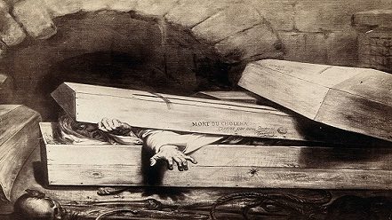 a black and white photo of a person in a box.