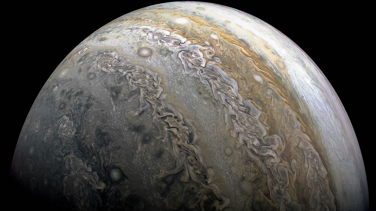 a close up of the planet with a black background.