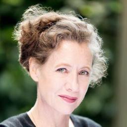 a woman with curly hair.