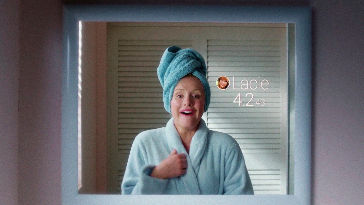 a woman with a towel wrapped around her head.