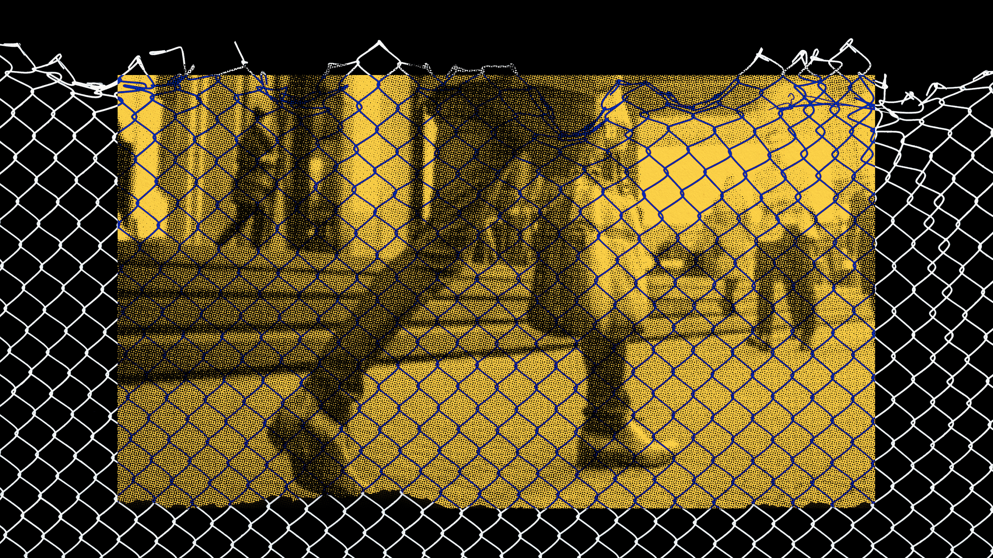 a black and white photo of a person behind a fence.