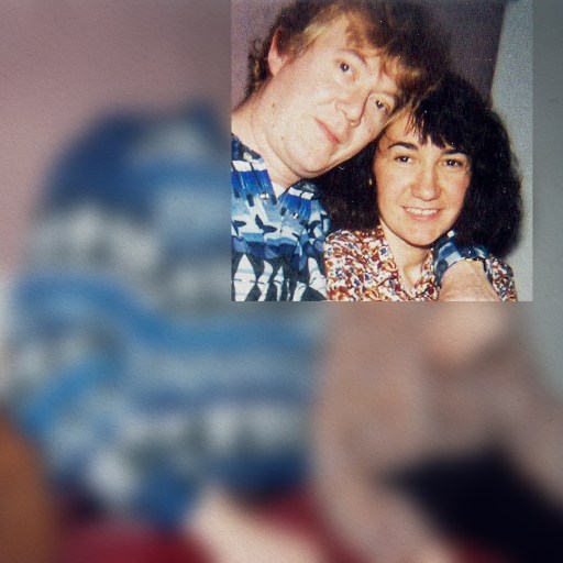 a man and a woman posing for a picture.