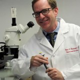 A man in a lab coat.