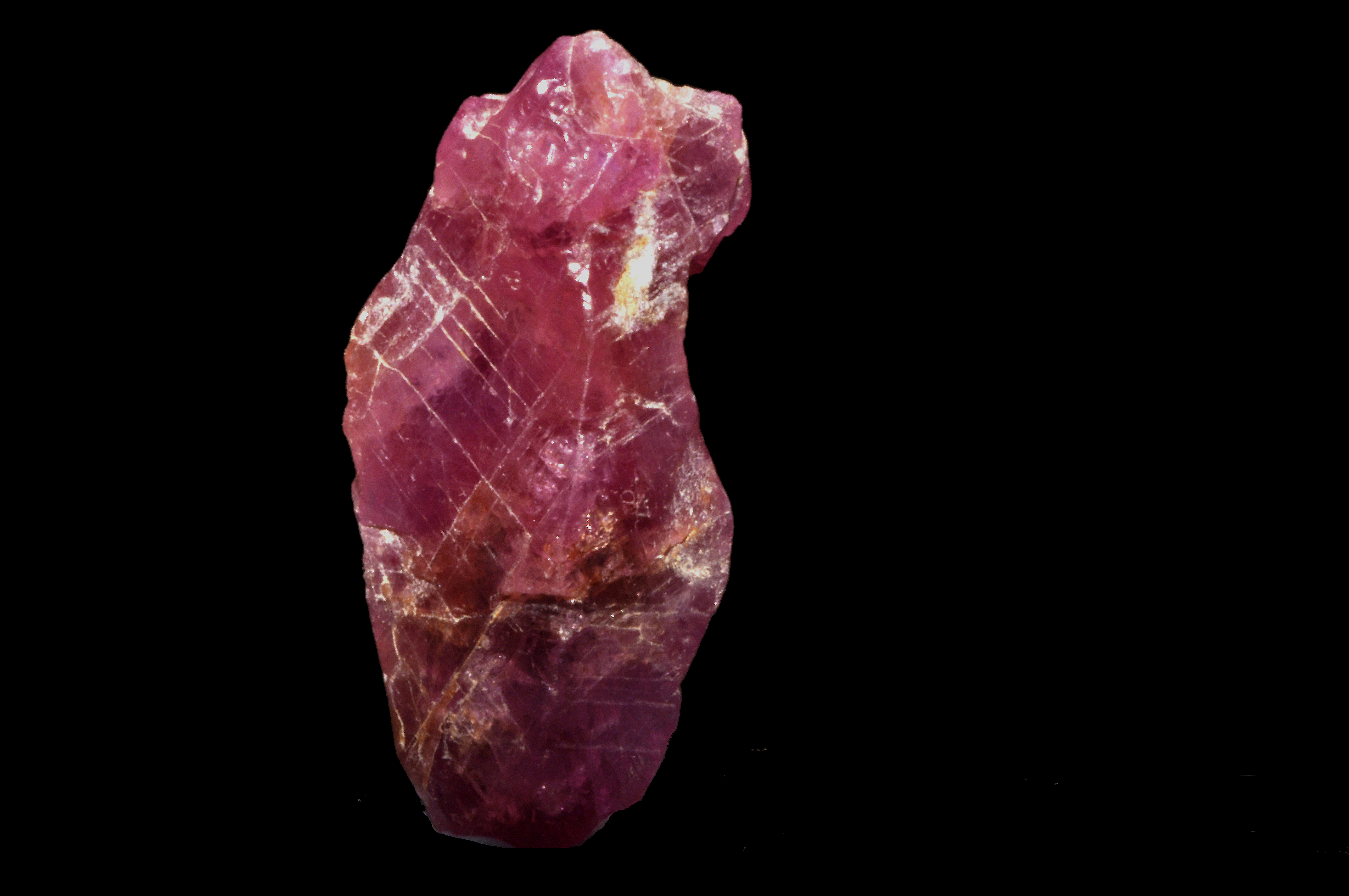 A ruby against a back background