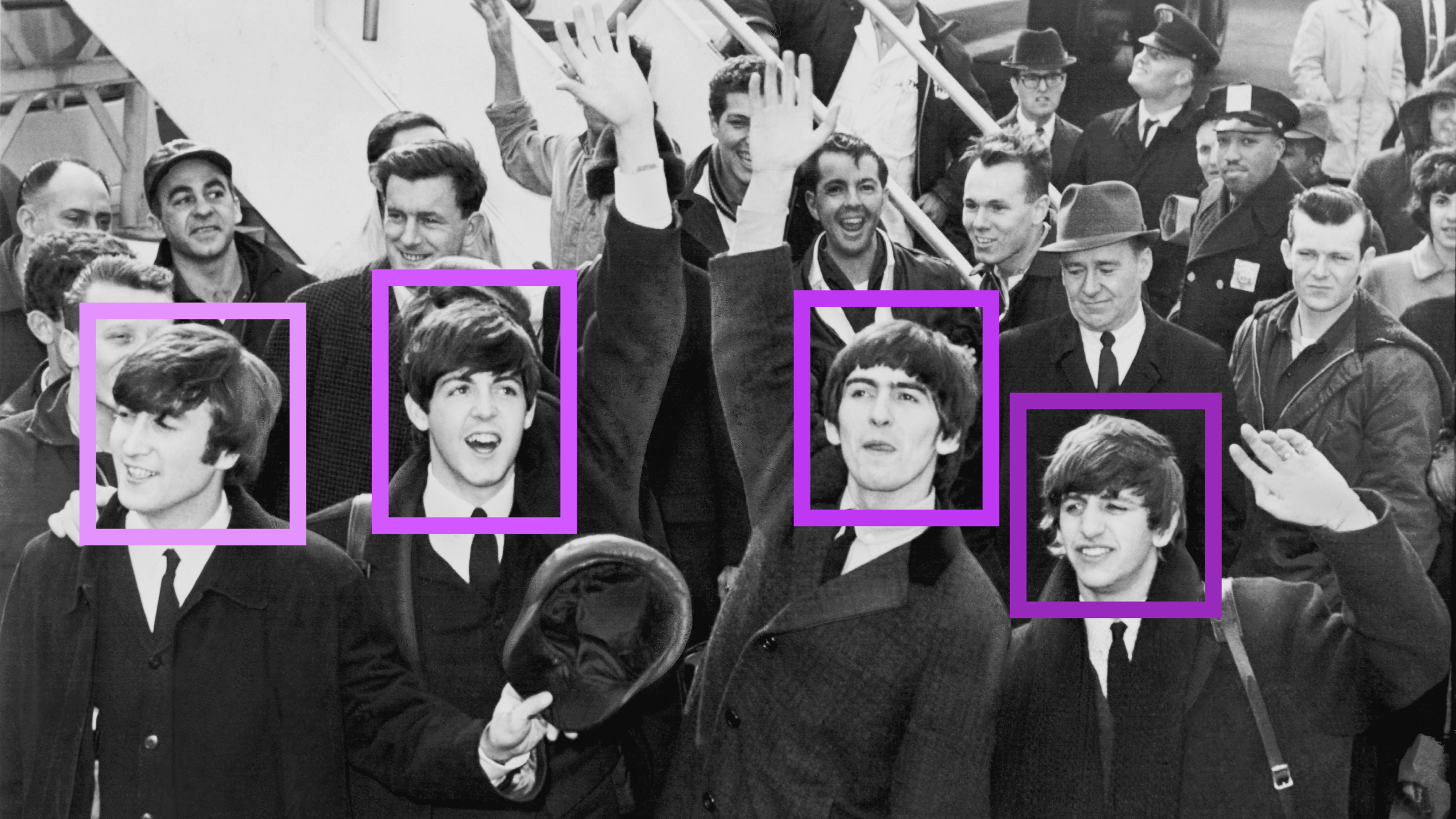 The demixed Beatles are shown in a crowd of people at the Hollywood Bowl.