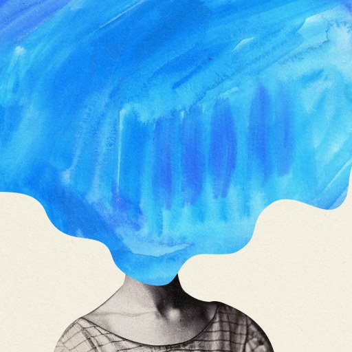 A woman's head with blue paint on it.