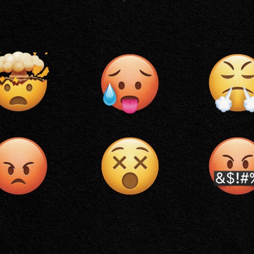 Outrage machine fueled by emojis with expressions on a black background.