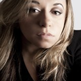 A woman with long hair.