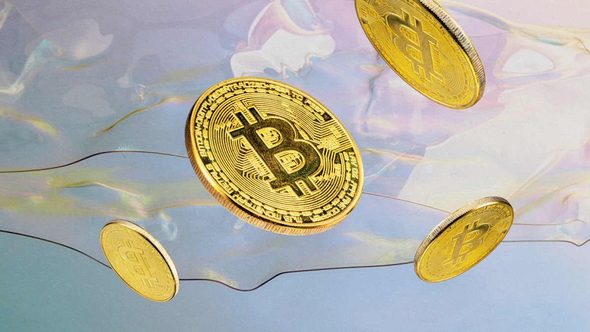 A cluster of bitcoins suspended in mid-air.