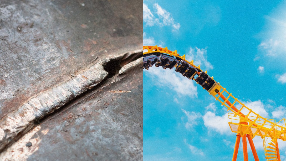 A picture of a roller coaster with broken metal structures against the backdrop of the sky.