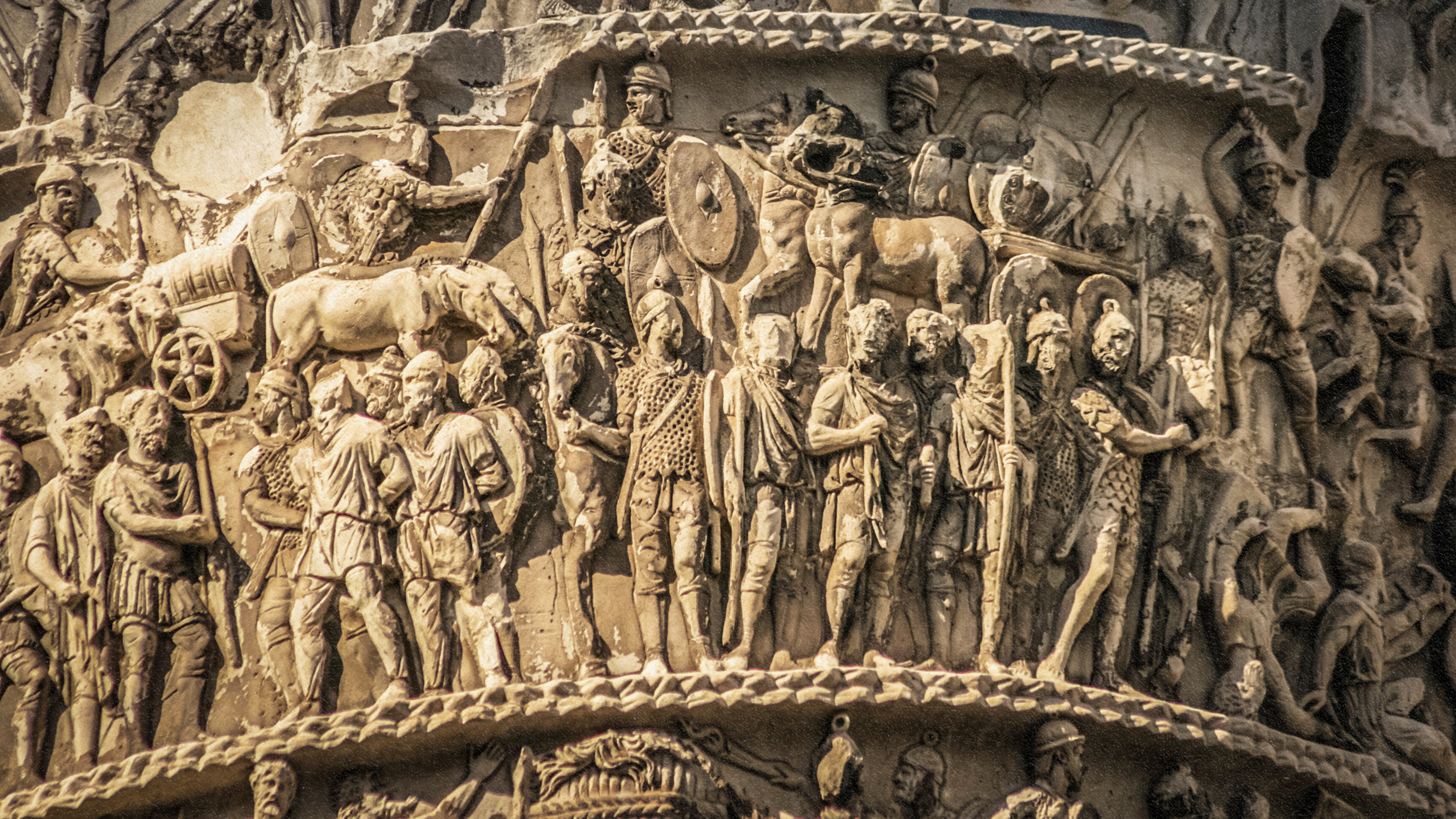 A statue of a man on a column, reflecting the history of pants.