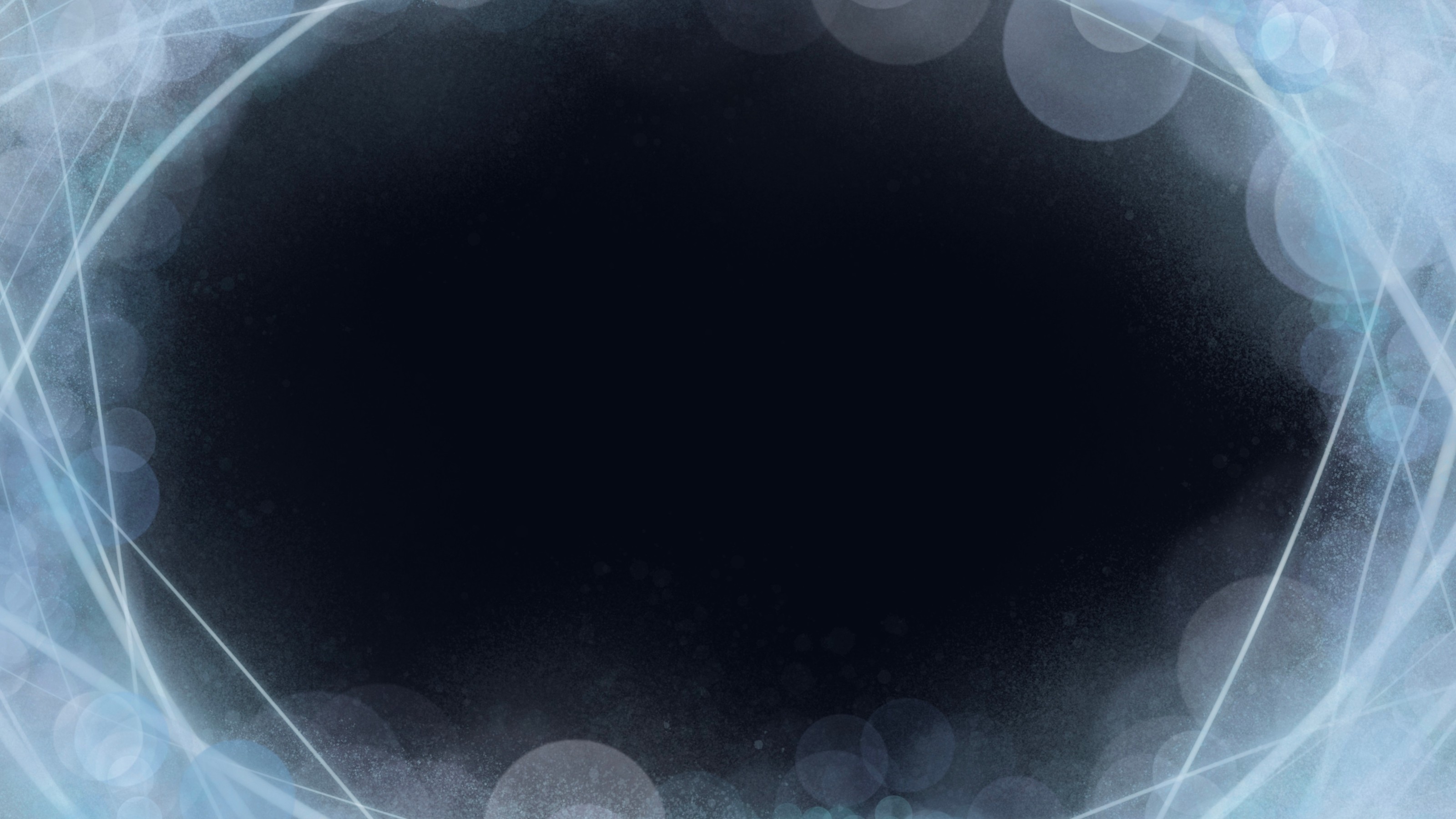 A blue circle with bokeh lights around it.