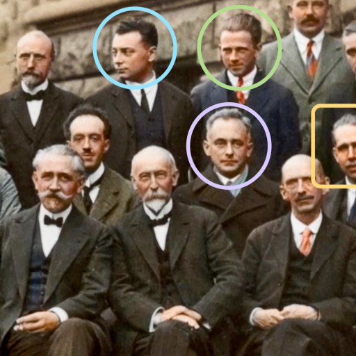 A photo of a group of men with different colored circles on their heads.