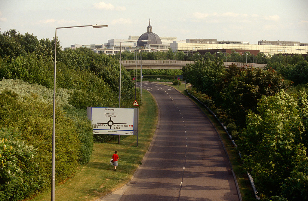 A person is walking down a road.