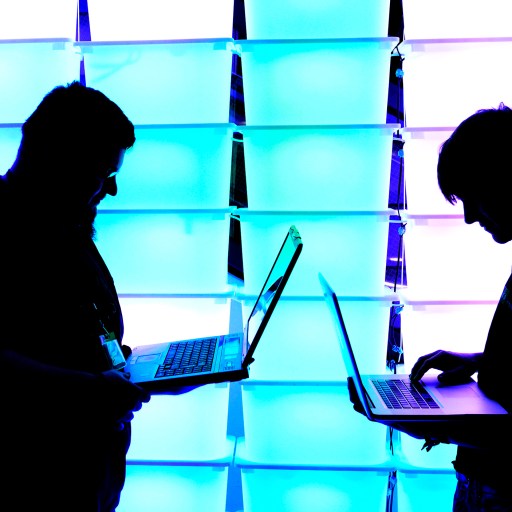A man sporting an AI strategy t-shirt.