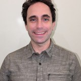 A man smiling for a picture.