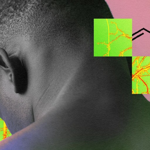 A man's back with a man's head in front of a colorful background.