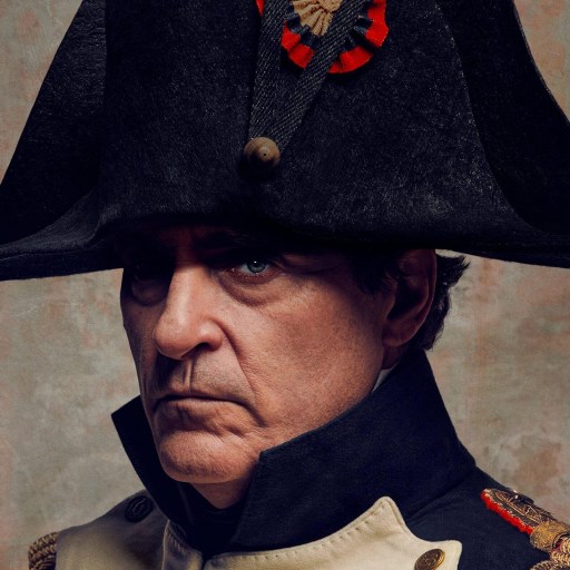 A man in a military uniform wearing a hat resembling Napoleon.