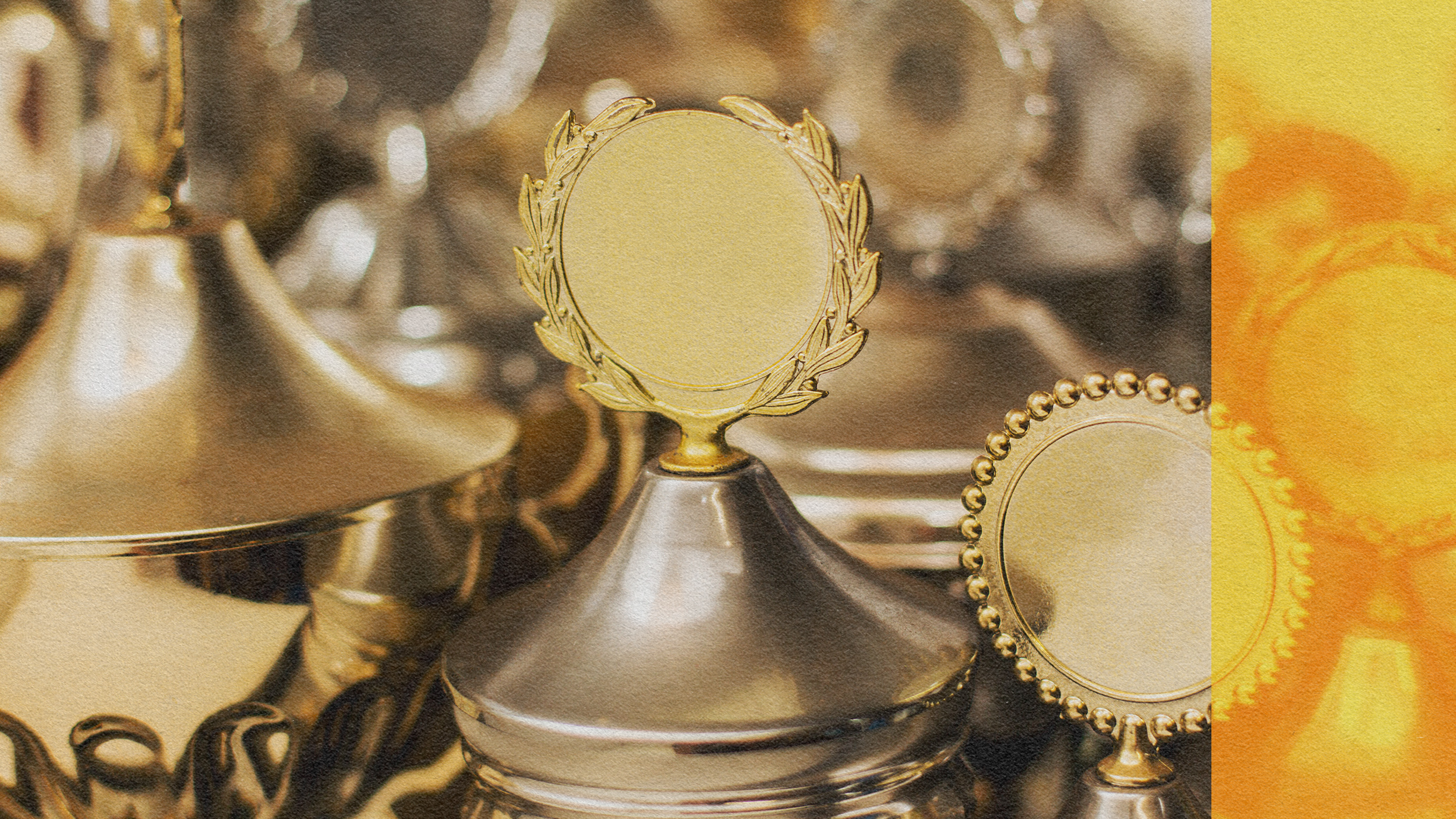 A group of gold trophies showcasing too much talent on a table.