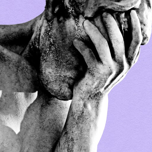 A statue of a man with his hands on his head, symbolizing regret.