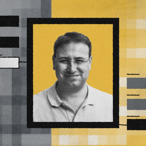 A grayscale image of a man inside a black frame with yellow, gray, and black geometric patterns in the background, subtly illustrating collaborative team skills.